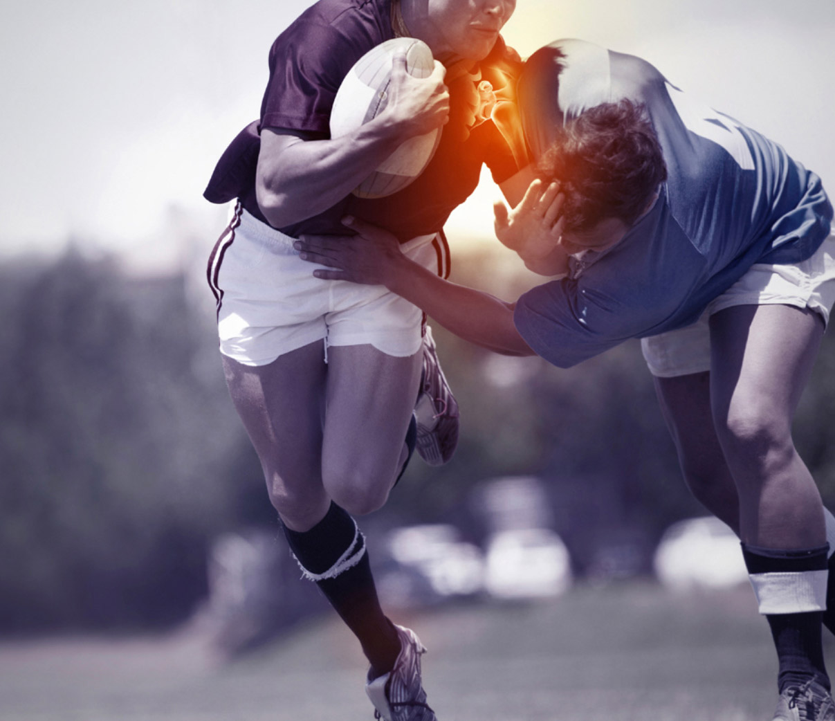 An image of two rugby players making contact with one another is pictured with a superimposed skeletal image of the shoulder joint and is highlighted in yellow.  Overlaying this image are the letters MTX and the words massage therapy are below it to represent the relevant massage therapy treatment services offered.